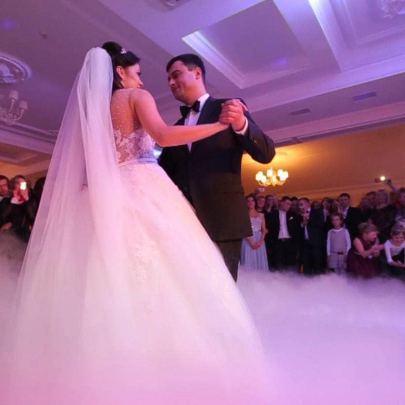 Wedding DJ setup with lighting and dancefloor ready for first dance