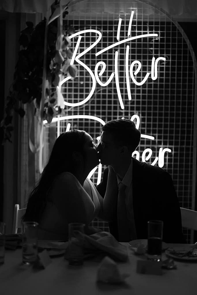Professional wedding DJ performing at Fanhams Hall with packed dancefloor and elegant lighting setup