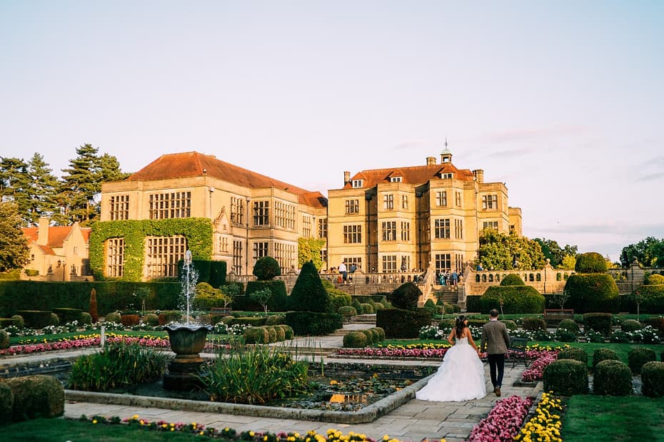 Fanhams Hall wedding DJ hire with elegant lighting, professional disco setup and a packed dancefloor during a wedding reception in Ware, Hertfordshire